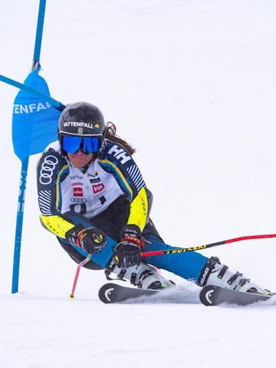 Woman wearing alpine racing gloves