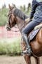 Woman wearing horse riding gloves