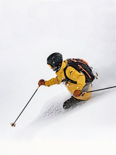 Skier wearing Alpine Pro gloves