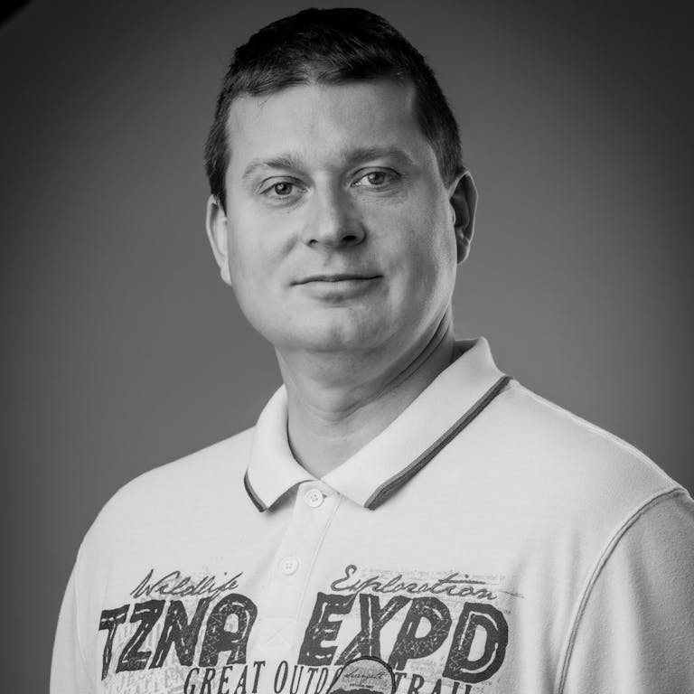 Krisztian Tenke Portrait of a man in a white polo shirt